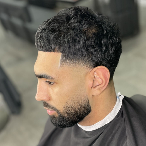 Professional skin fade haircut at 1Kal Barbers Batley - precision fade with seamless blending